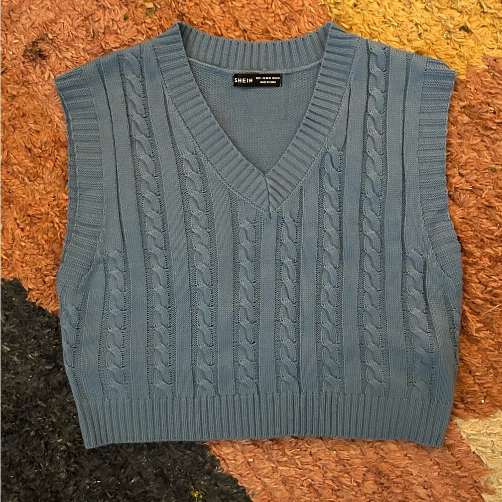 Blue sweater vest size L